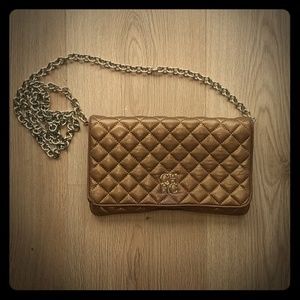 Quilted Carolina Herrera gold crossbody bag